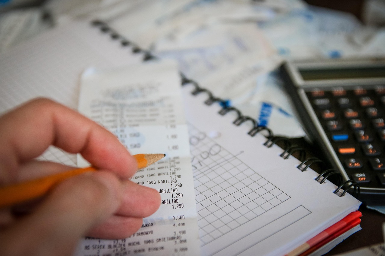 Money, bills, calculator — Expert Opinions on Futures Trading: What You Need to Know