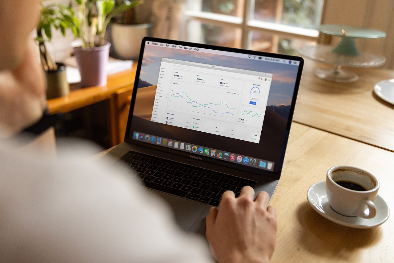 Laptop, work, coffee — Simplify EHR Tasks Using an AI Medical Scribe