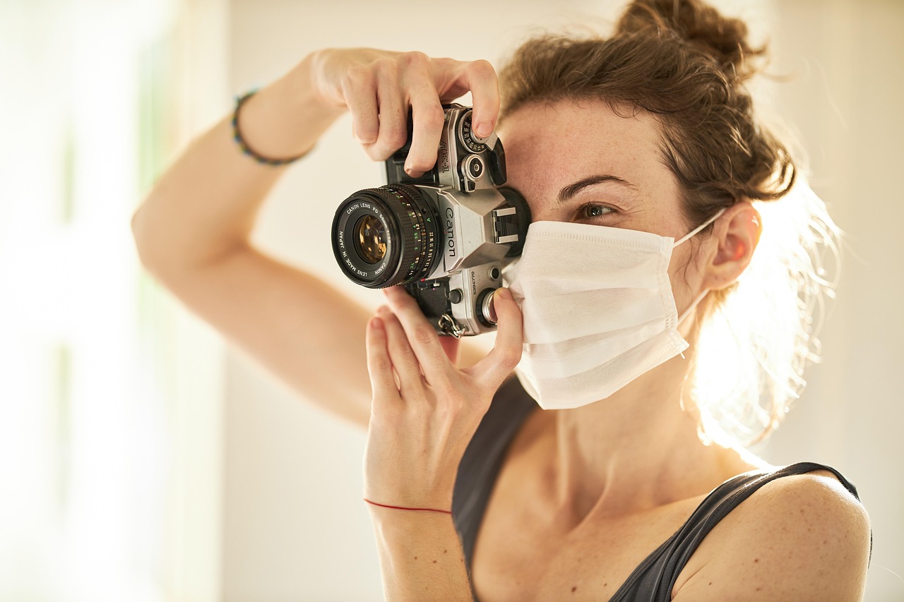 Photographer, coronavirus, mask — Transforming Everyday Health with Stuart Piltch Wellness Insights