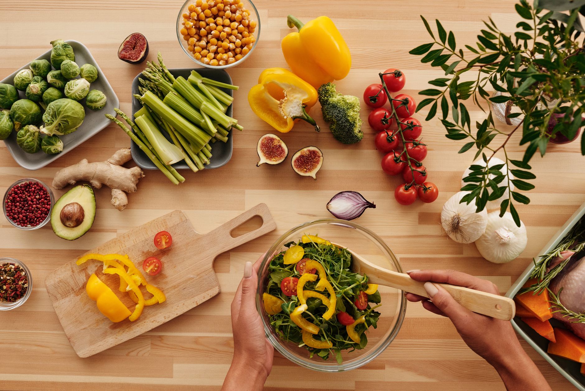 Top view of fresh vegetables and salad preparation on a wooden table, perfect for healthy eating concepts. — What's "ACE" Wei